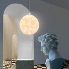 3D printed moon pendant light by DEMOLIGHTS, eco-friendly lunar globe chandelier for bedroom ceiling lighting.