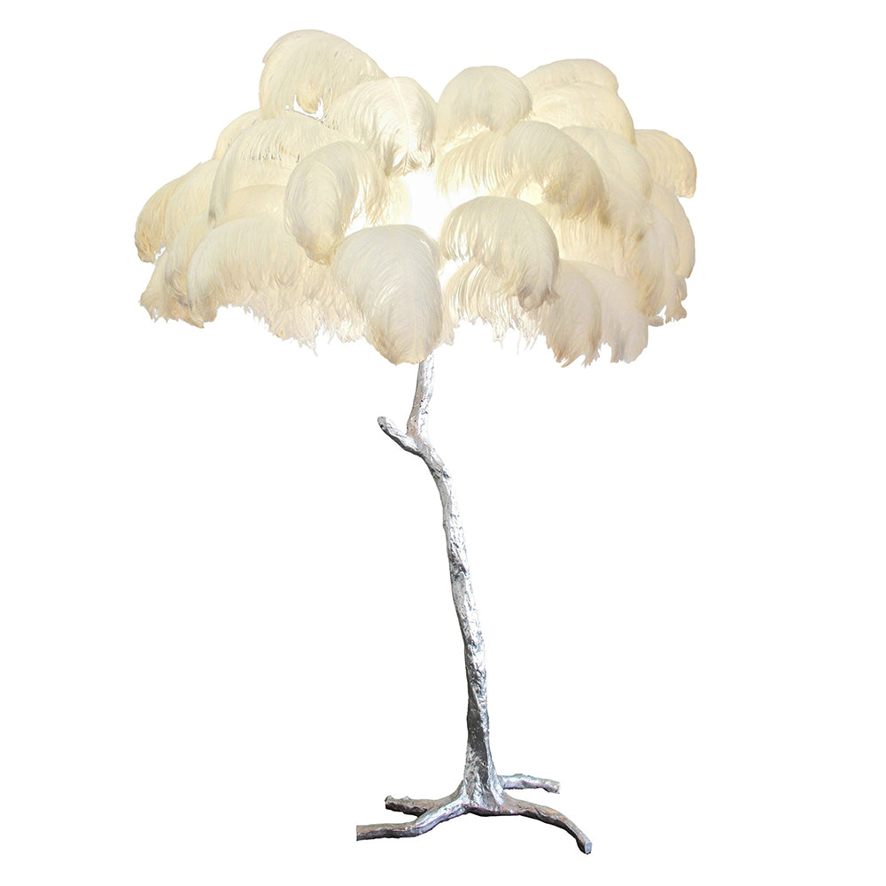 Luxury DEMOLIGHTS ostrich feather brass floor lamp with elegant feather shade and polished brass base, standing tall in a modern interior.