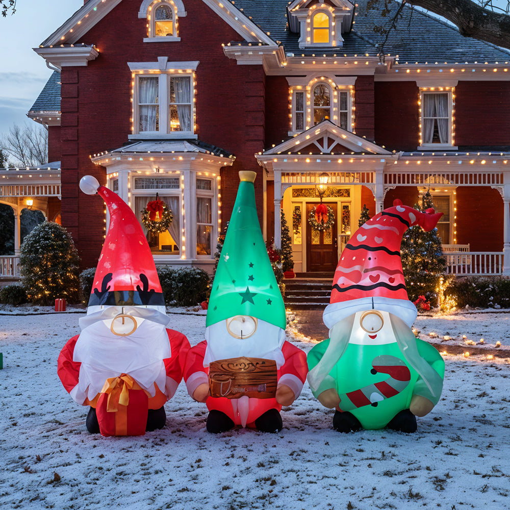 Christmas inflatable gnome trio with LED lights, decorated for holiday display, from Garden Sanctuary.