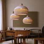 Handwoven rattan pendant light by DEMOLIGHTS, boho ceiling lamp ideal for kitchen island decor, featuring a natural woven design.