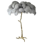 Luxury DEMOLIGHTS ostrich feather brass floor lamp with elegant feather shade and sleek brass base, modern lighting for stylish interiors.