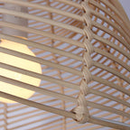 Handmade conch wicker pendant lamp with rattan and bamboo lampshade, stylish DEMOLIGHTS hanging light for home decor.