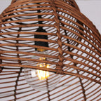 Handmade conch wicker pendant light with rattan and bamboo lampshade by DEMOLIGHTS, showcasing a natural, woven design.