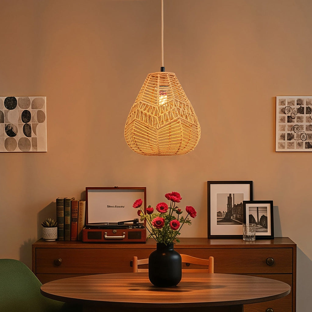 E27 rattan-woven ceiling pendant light by Garden Sanctuary with a warm, natural woven rattan shade hanging from the ceiling.