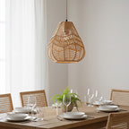 E27 rattan-woven ceiling pendant light by Garden Sanctuary hanging with warm natural wicker design for cozy interior lighting