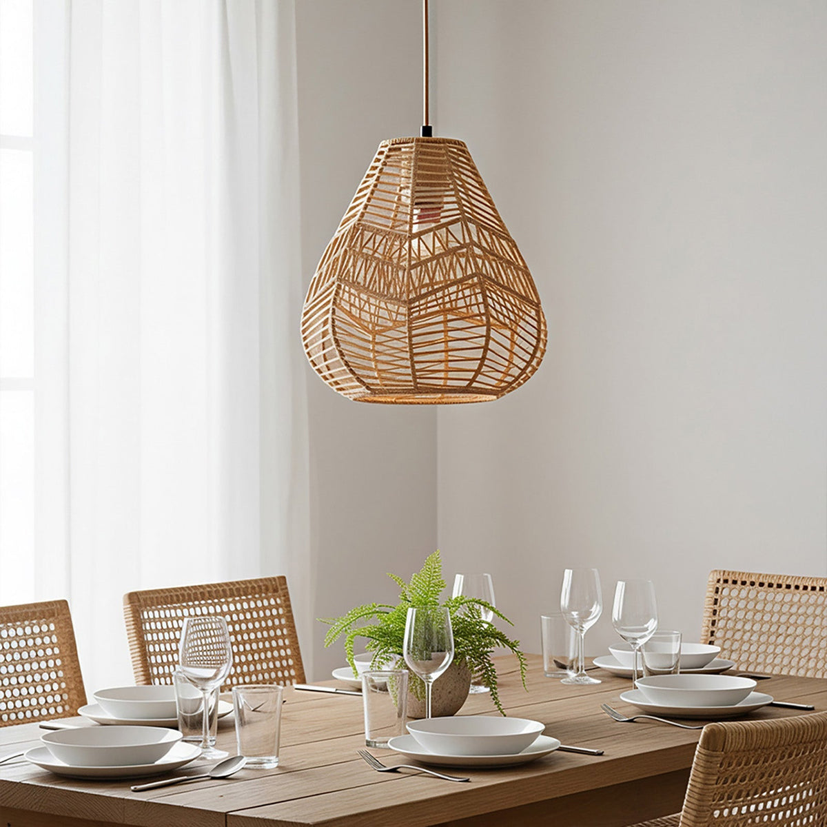 E27 rattan-woven ceiling pendant light by Garden Sanctuary hanging with warm natural wicker design for cozy interior lighting