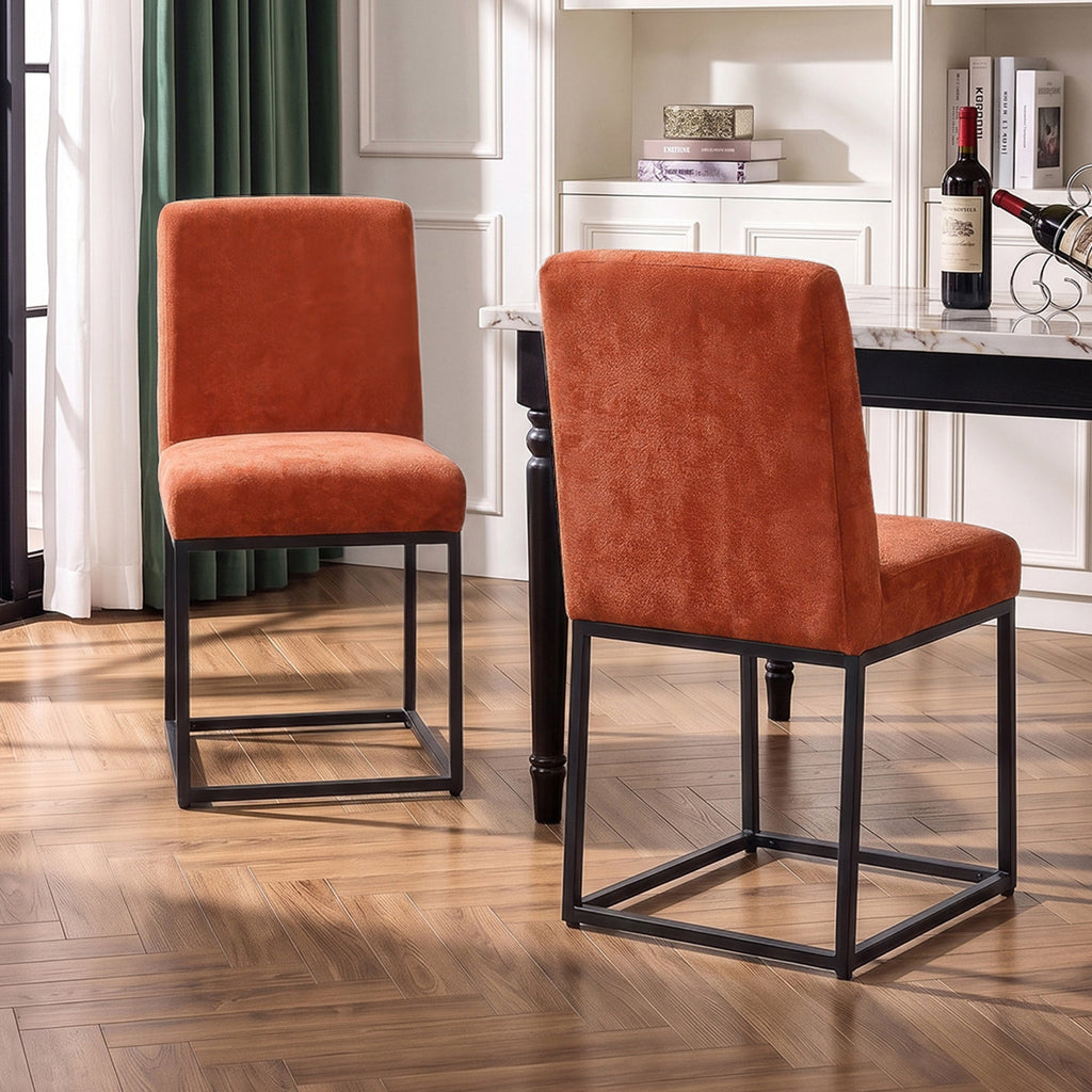 Set of 2 chenille upholstered dining chairs with black metal legs, featuring plush fabric and modern design by Garden Sanctuary.