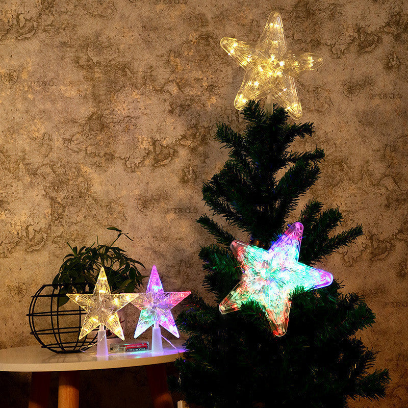 Christmas LED star tree topper by Garden Sanctuary, glowing white star with festive lights for holiday decoration.