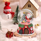 Santa Claus snow globe music box Christmas ornament with glass design by Garden Sanctuary, featuring a festive holiday scene.