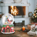 Garden Sanctuary Santa Claus snowball gift music box Christmas glass ornament with festive holiday design and intricate details.