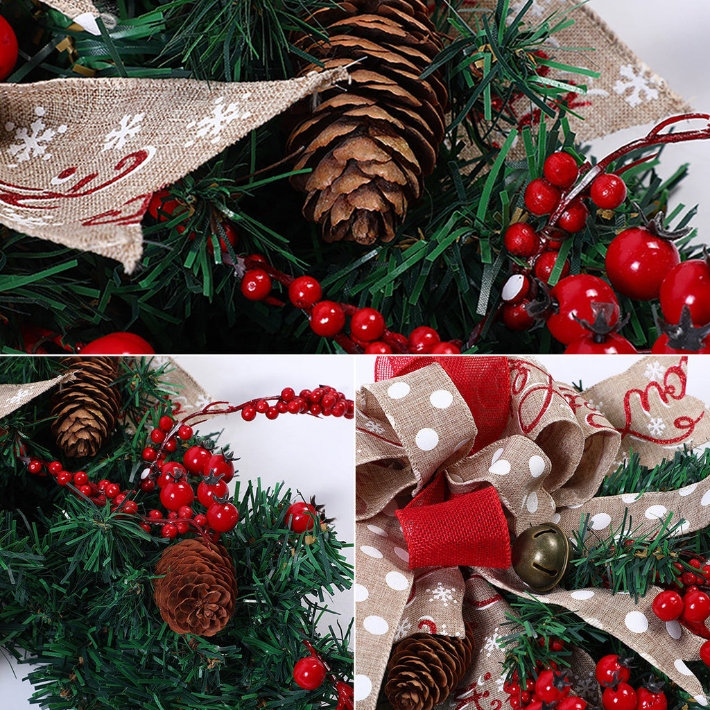 Christmas teardrop swag with lights from Garden Sanctuary, decorated with pine, berries, and festive greenery.