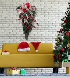 Christmas teardrop swag with lights from Garden Sanctuary, decorated with festive greenery and ornaments for holiday decor.