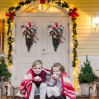 Garden Sanctuary Christmas teardrop swag with lights, decorated with festive greenery and ornaments for holiday decor.