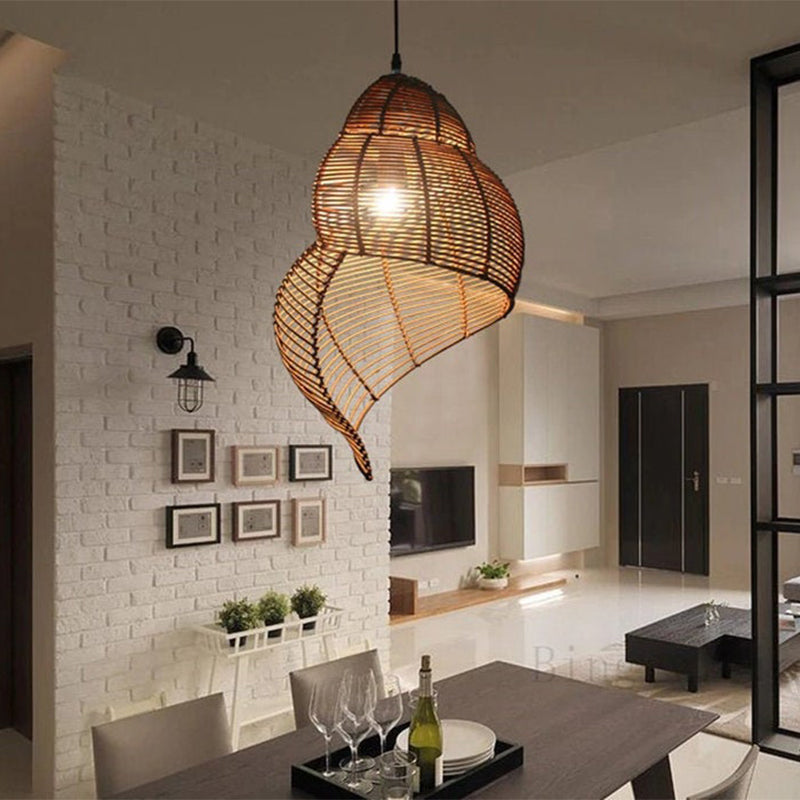 Handmade conch wicker pendant light with rattan and bamboo lampshade by DEMOLIGHTS, showcasing a natural, woven design.