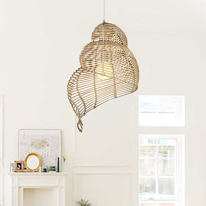 Handmade conch wicker pendant light by DEMOLIGHTS with rattan and bamboo lampshade, showcasing intricate woven design.