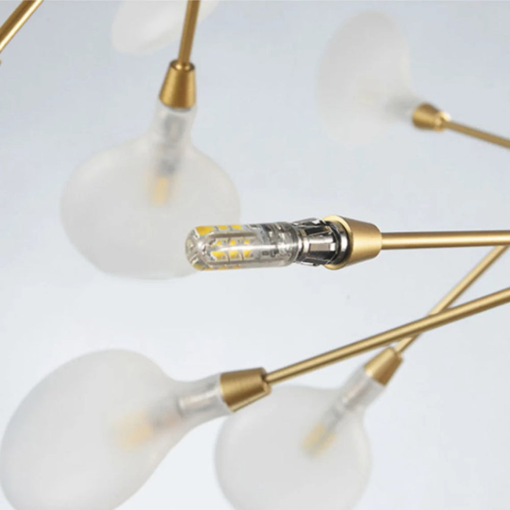 Modern Firefly LED chandelier by DEMOLIGHTS featuring Nordic leaf branch design with glowing LED lights for elegant lighting.