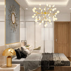Modern Firefly LED chandelier by DEMOLIGHTS featuring Nordic leaf branch design with multiple LED lights, hanging pendant style.