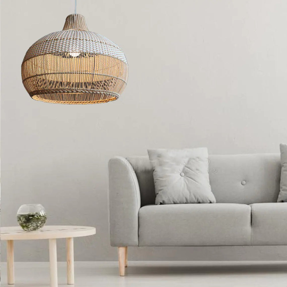 Handwoven rattan pendant light by DEMOLIGHTS hanging over a kitchen island, featuring a boho ceiling lamp design.