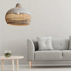 Handwoven rattan pendant light by DEMOLIGHTS hanging over a kitchen island, featuring a boho ceiling lamp design.