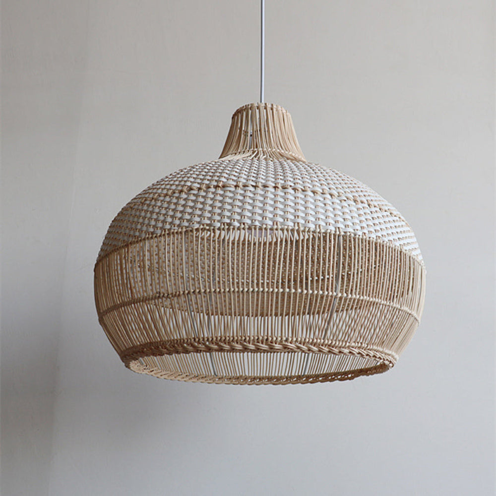 Handwoven rattan pendant light by DEMOLIGHTS hanging over a kitchen island, featuring a boho ceiling lamp design.
