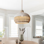 Handwoven rattan pendant light by DEMOLIGHTS hanging above a kitchen island, boho style ceiling lamp with intricate weaving.
