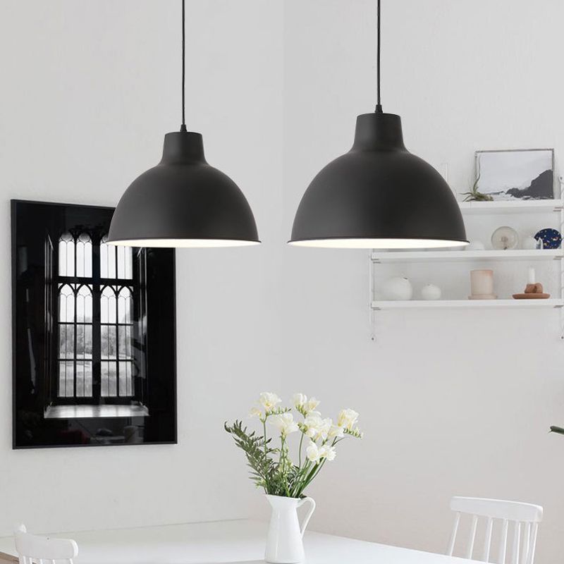 Colorful iron pendant light fixture by DEMOLIGHTS hanging from ceiling, featuring vibrant colors and modern design.