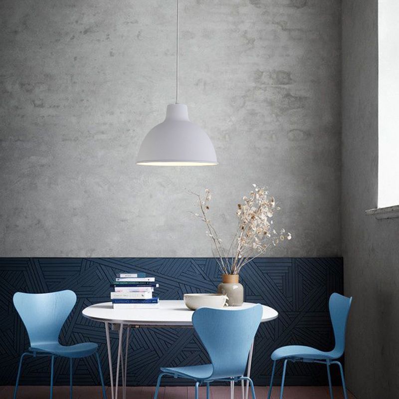 Colorful iron pendant light fixture by DEMOLIGHTS hanging from ceiling with vibrant, multicolor design and modern style.