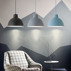 Colorful iron pendant ceiling light fixture by DEMOLIGHTS with vibrant multicolored glass shades hanging from a sleek metal frame.