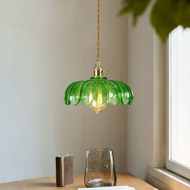 Brass and glass dome ceiling pendant light by DEMOLIGHTS, showcasing a stylish fixture with a metal and glass shade.