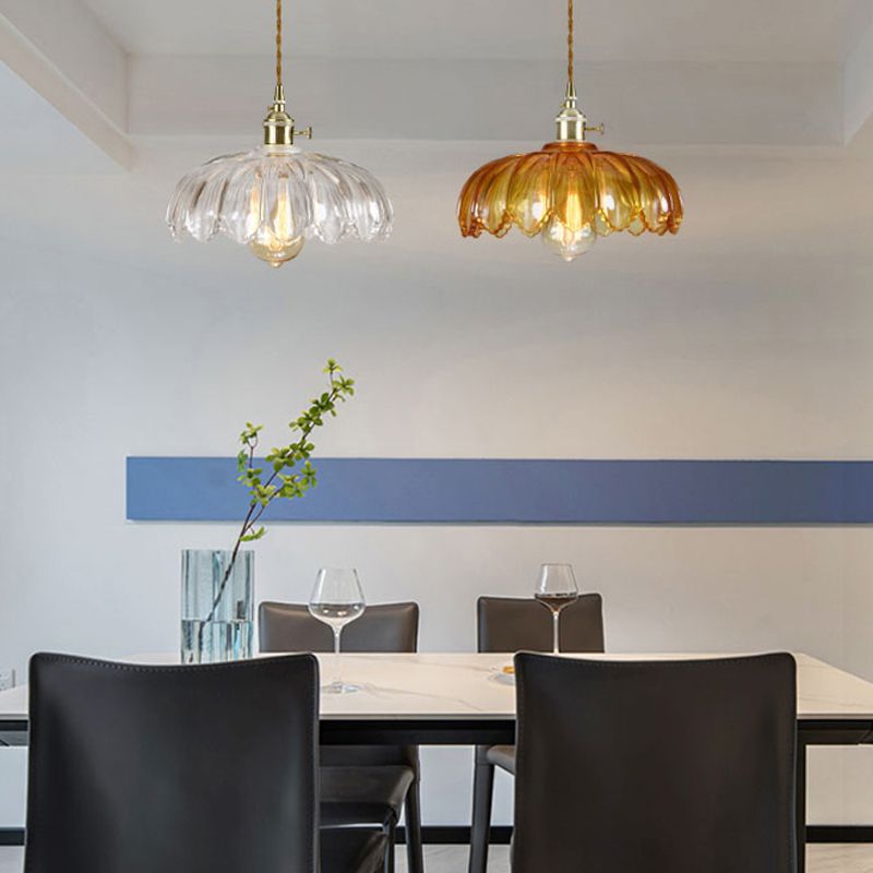Brass and glass dome pendant ceiling light by DEMOLIGHTS, featuring a stylish design with a glass shade and brass fixture.