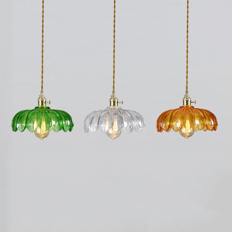 Brass and glass dome pendant light from DEMOLIGHTS, hanging ceiling lighting fixture with a modern design.