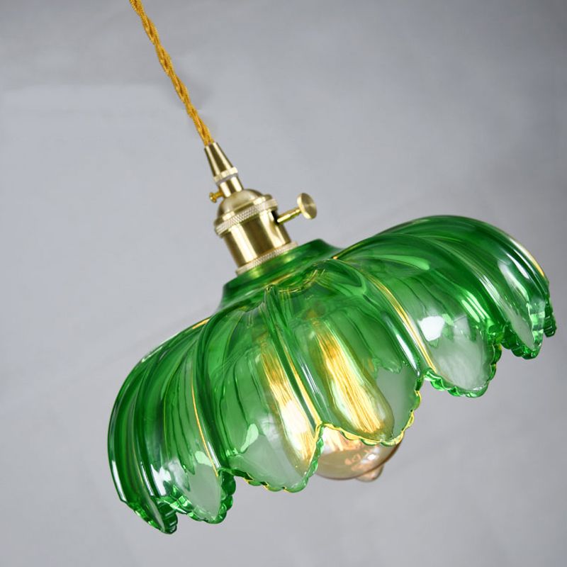 Elegant brass and glass dome pendant light by DEMOLIGHTS, showcasing a stylish ceiling lighting fixture with a clear glass dome.