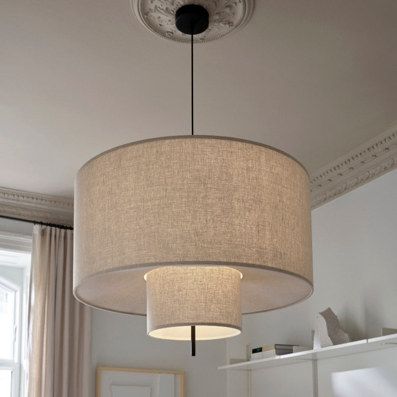 Modern fabric shade pendant light by Demolights featuring a sleek cylinder shape, ideal for contemporary interior lighting.