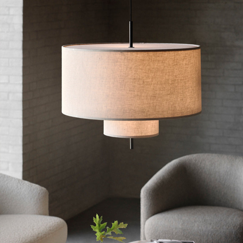 Modern fabric shade pendant light by Demolights featuring a sleek cylinder design, ideal for contemporary interior lighting.