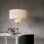 Modern fabric shade pendant light by Demolights featuring a sleek cylinder shape and contemporary design.