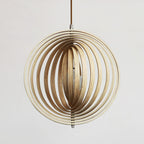 Handcrafted natural wood round globe pendant lampshade by DEMOLIGHTS, showing the textured wooden surface and round shape.