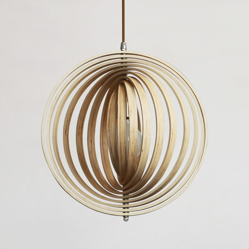 Handcrafted natural wood round globe pendant lampshade by DEMOLIGHTS, showing the textured wooden surface and round shape.