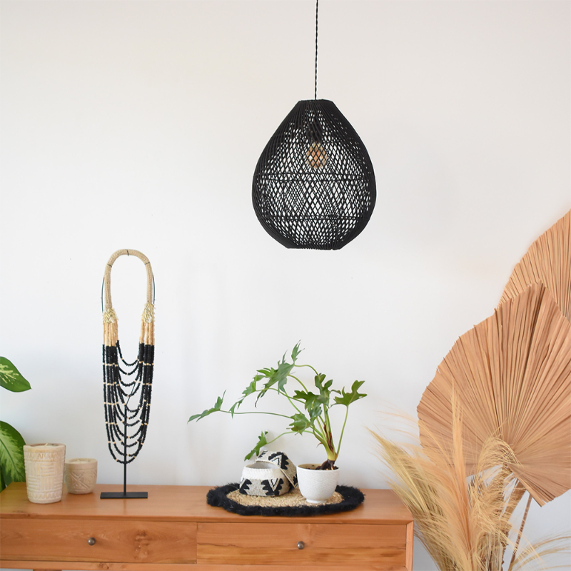 Handwoven black rattan pendant light from DEMOLIGHTS, showcasing its classic farmhouse design and intricate woven details.