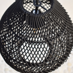 Black rattan farmhouse pendant light by DEMOLIGHTS, handcrafted handwoven design with a modern rustic style.