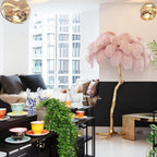 Luxury DEMOLIGHTS Ostrich Feather Brass Floor Lamp with elegant feather shade and polished brass base, modern lighting fixture.