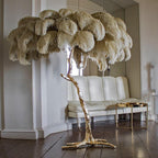 Luxury DEMOLIGHTS ostrich feather brass floor lamp with elegant feather shade and polished brass stand, modern lighting design.