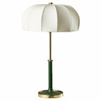 Mid century modern DEMOLIGHTS table lamp with sleek design and neutral-colored shade on a wooden table.