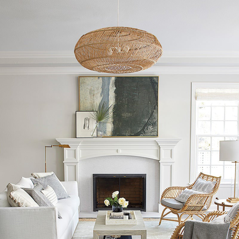 Rattan woven basket pendant lamp shade by DEMOLIGHTS, hanging as a stylish chandelier for modern or rustic interiors.