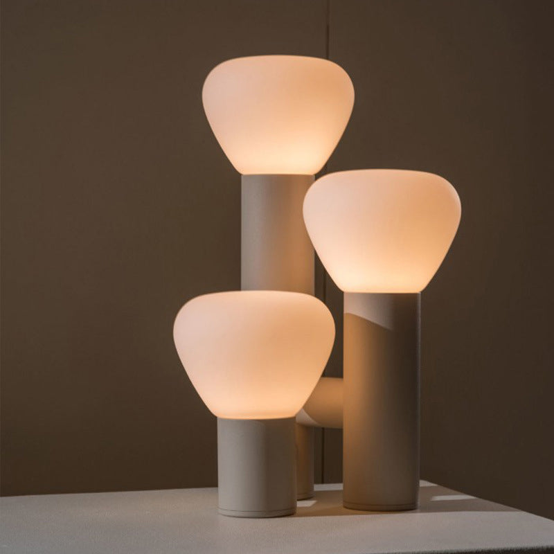 DEMOLIGHTS minimalist 3-light table lamp with red, green, and white shades, modern design, perfect for contemporary home decor.