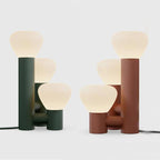 Minimalist DEMOLIGHTS 3-light table lamp with red, green, and white shades, modern design for contemporary home decor