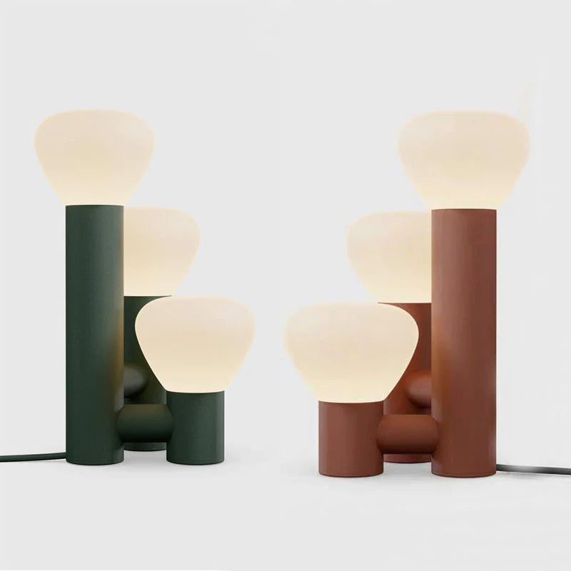 Minimalist DEMOLIGHTS 3-light table lamp with red, green, and white shades, modern design for contemporary home decor
