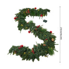 Garden Sanctuary Christmas wreath with LED light string, decorated with festive greenery and ornaments for holiday decor.
