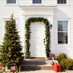 Christmas wreath with LED light string from Garden Sanctuary, decorated with evergreen foliage and festive ornaments.