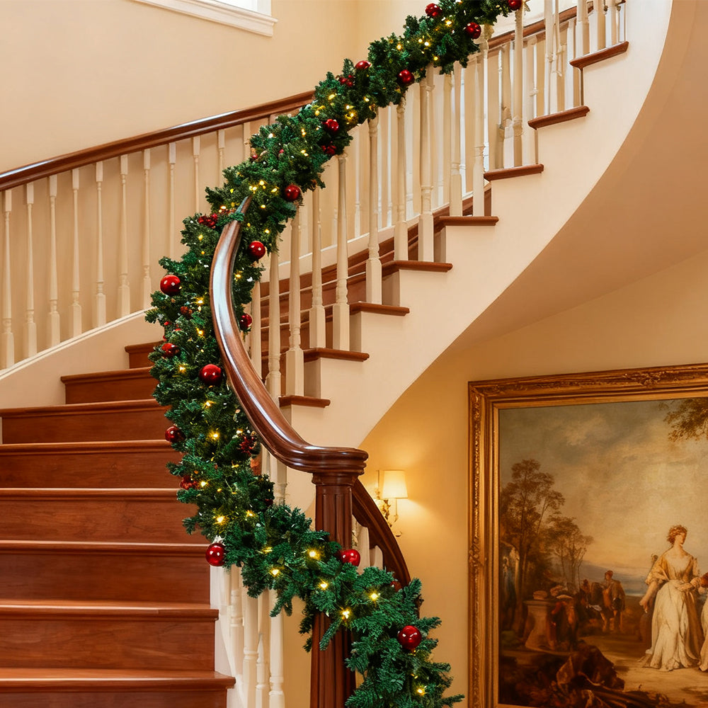 Christmas wreath with LED light string from Garden Sanctuary, decorated with greenery and festive embellishments.