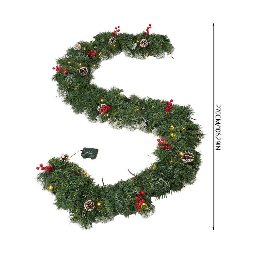 Christmas wreath with LED light string from Garden Sanctuary, decorated with greenery and festive accents for holiday decor.